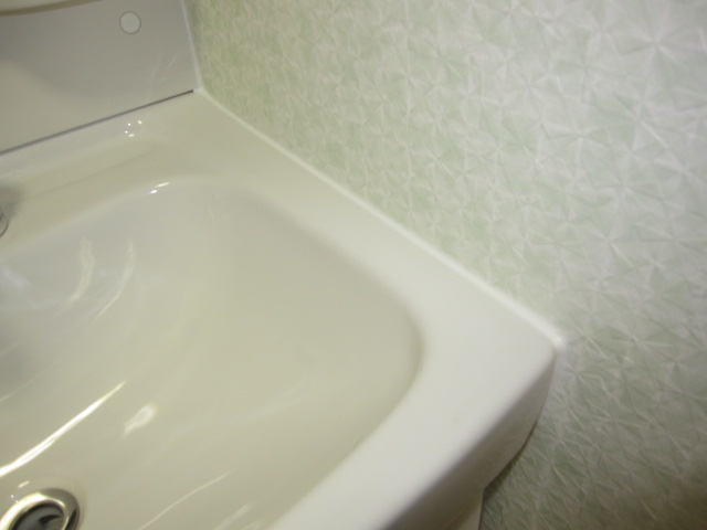 埼玉県所沢市　賃貸物件原状回復　洗面所水周りコーキング　作業完了後　２